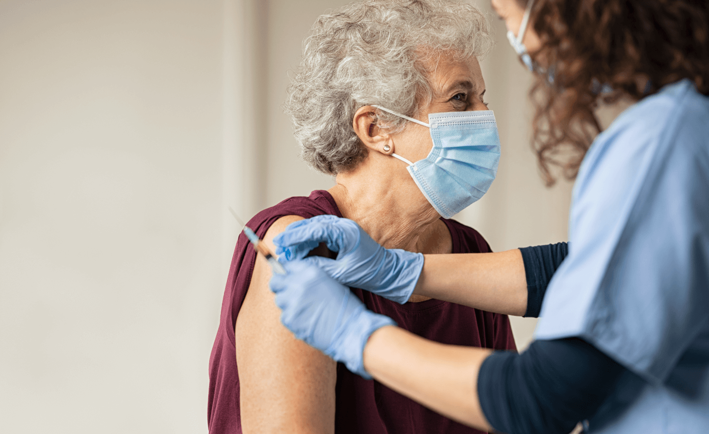 An old woman gets an injection